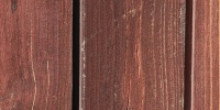 fence vertical weathered architectural wood dark brown boards