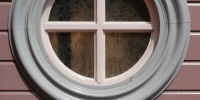 gray multicolored glass wood architectural round window