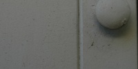 gray wood architectural dirty vertical handle door