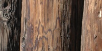 fence vertical weathered architectural wood dark brown