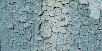 blue paint wood architectural weathered cracked/chipped vertical fence boards