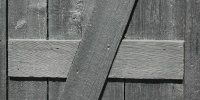 black paint wood architectural angled fence boards