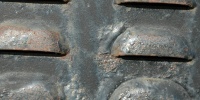black paint metal industrial rusty horizontal vent/drain