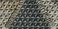 manhole triangular textual industrial metal gray