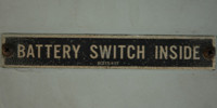 gray metal industrial mech/elec textual rectangular horizontal sign