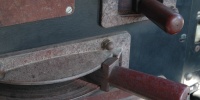 gray metal industrial vehicle rusty handle
