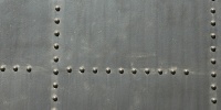black paint metal industrial weathered spots rectangular fastener