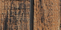 boards fence vertical weathered architectural wood dark brown