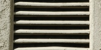 white metal stucco/plaster architectural shadow rectangular horizontal vent/drain
